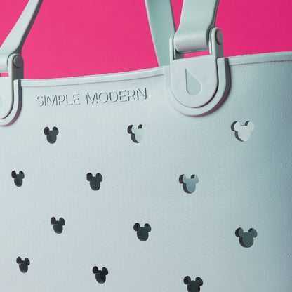 Light mint green tote bag on hot pink background