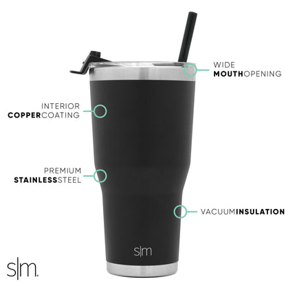 Black matte stainless steel tumbler with silver-tone rim and base against dark background