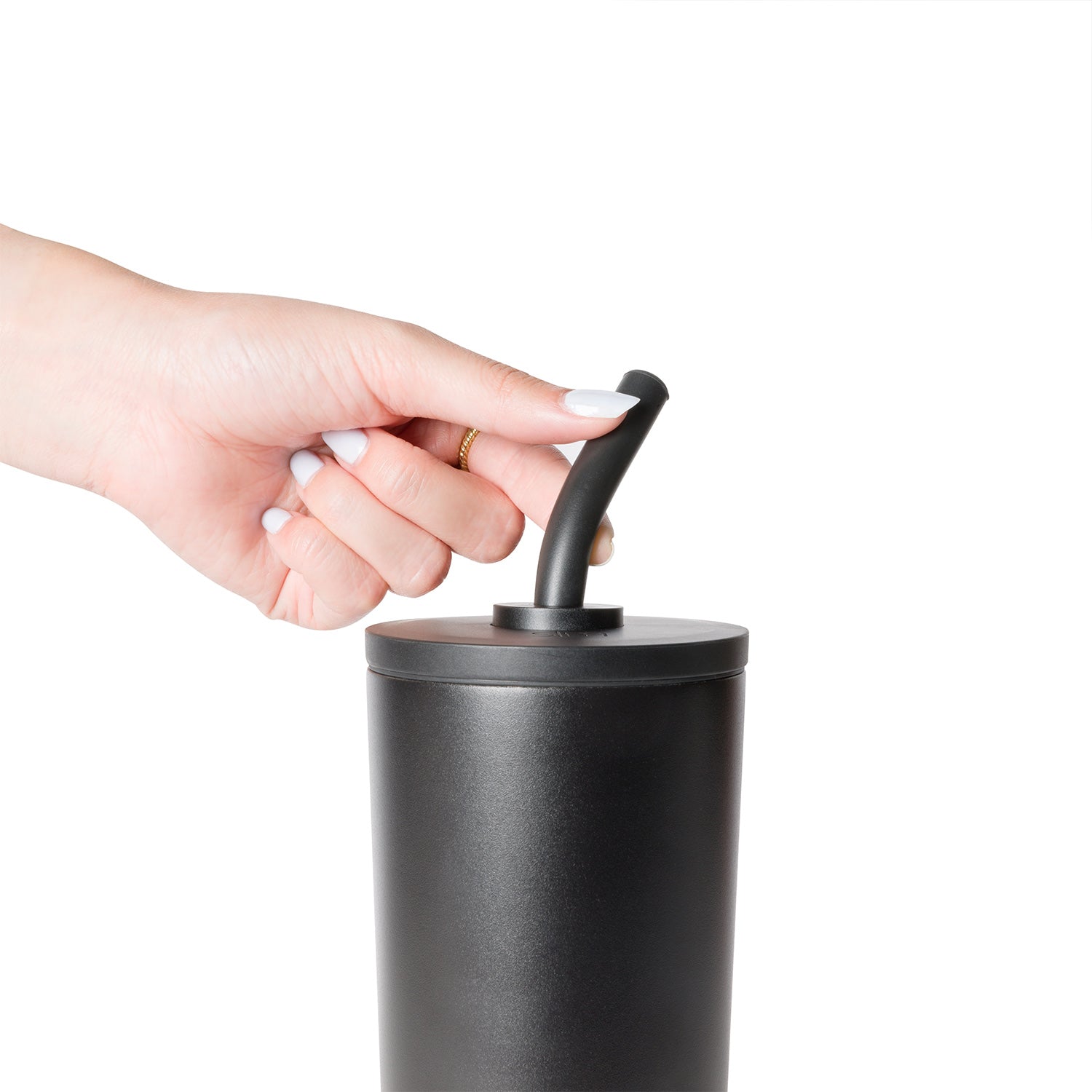 Charcoal gray cylindrical tumbler with white straw against white background
