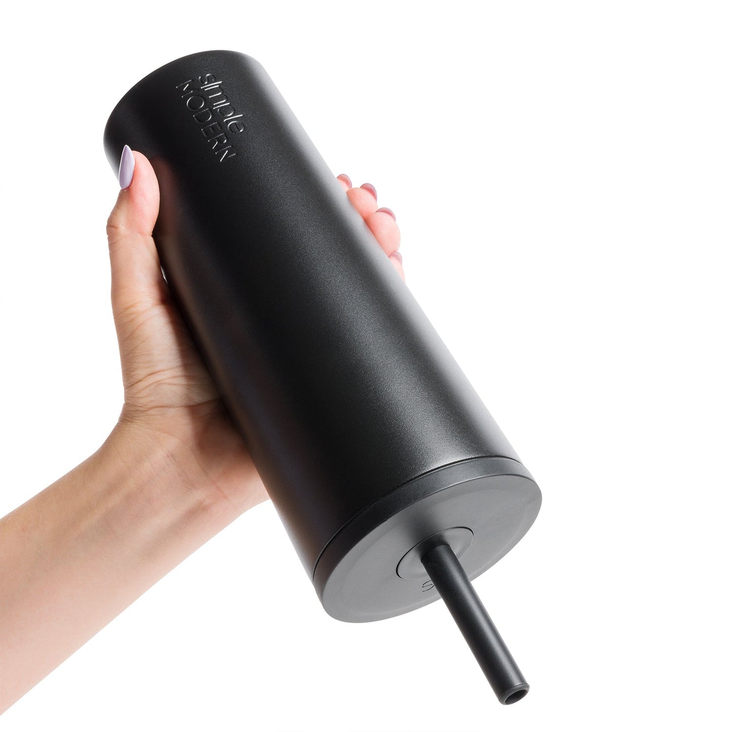 Matte black cylindrical tumbler with metallic sheen and gray circular base, shown upside down against white background