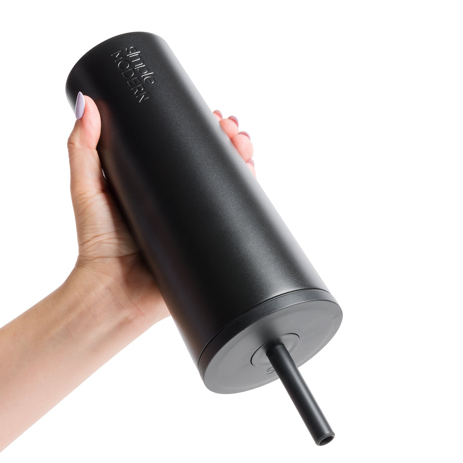 Matte black cylindrical tumbler with metallic sheen and gray circular base, shown upside down against white background