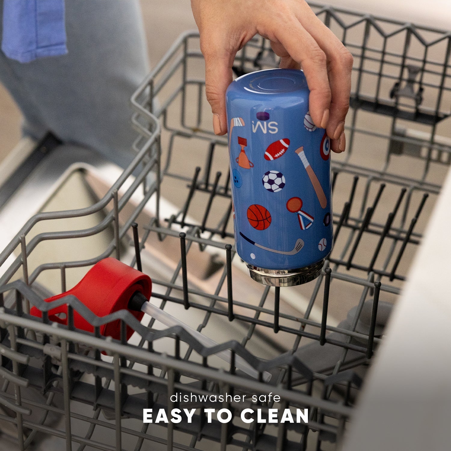 Blue insulated kids water bottle with sports graphics held inside an open dishwasher, displaying "dishwasher safe" and "easy to clean" text at bottom.