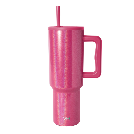 Hot pink tumbler with iridescent glitter finish and shimmering silver holographic highlights